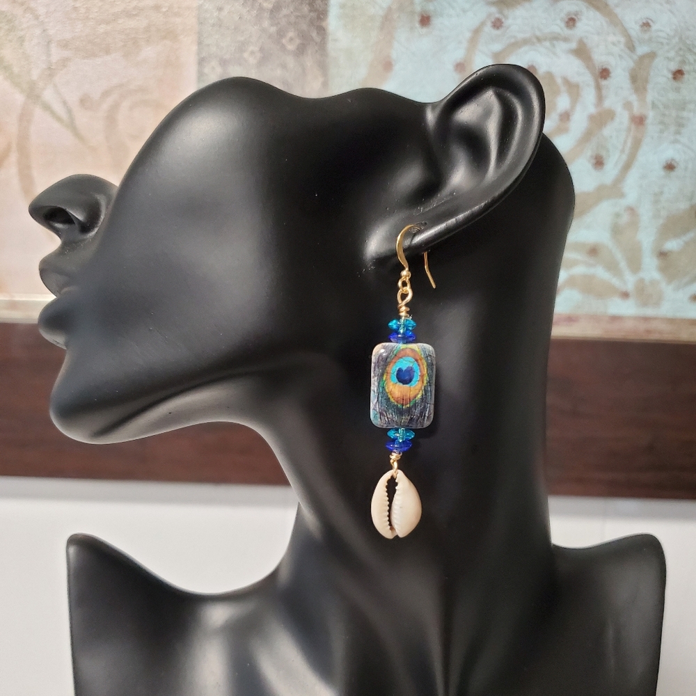 Peacock earrings with gold findings.